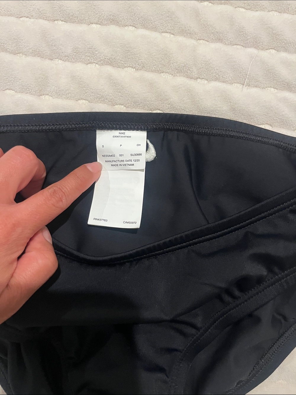 Nike Black Swim Brief with White Swoosh Accent - Picture 3 of 5